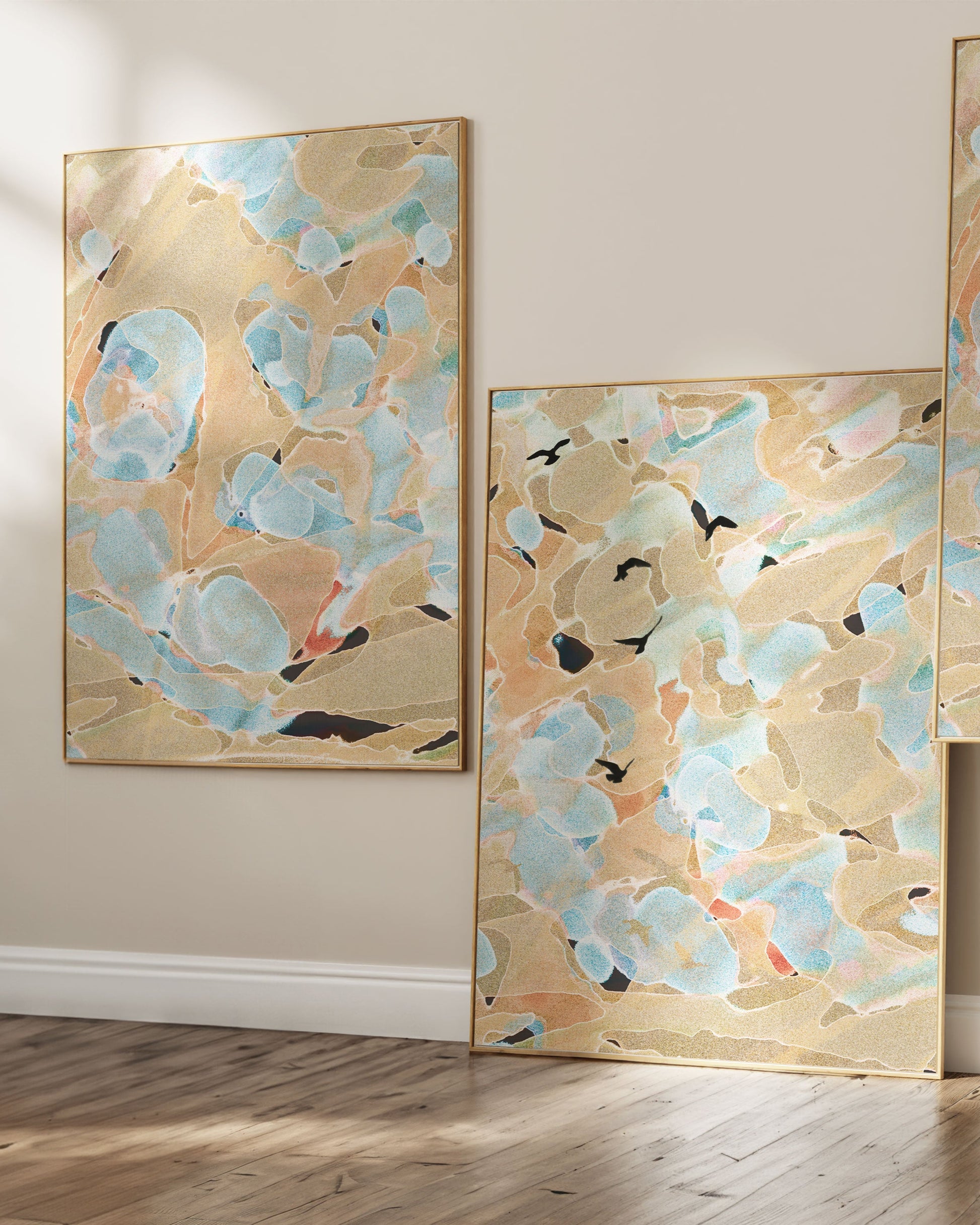 Floral abstract poster in soft blue, yellow, and beige tones, styled in a calming bedroom interior.